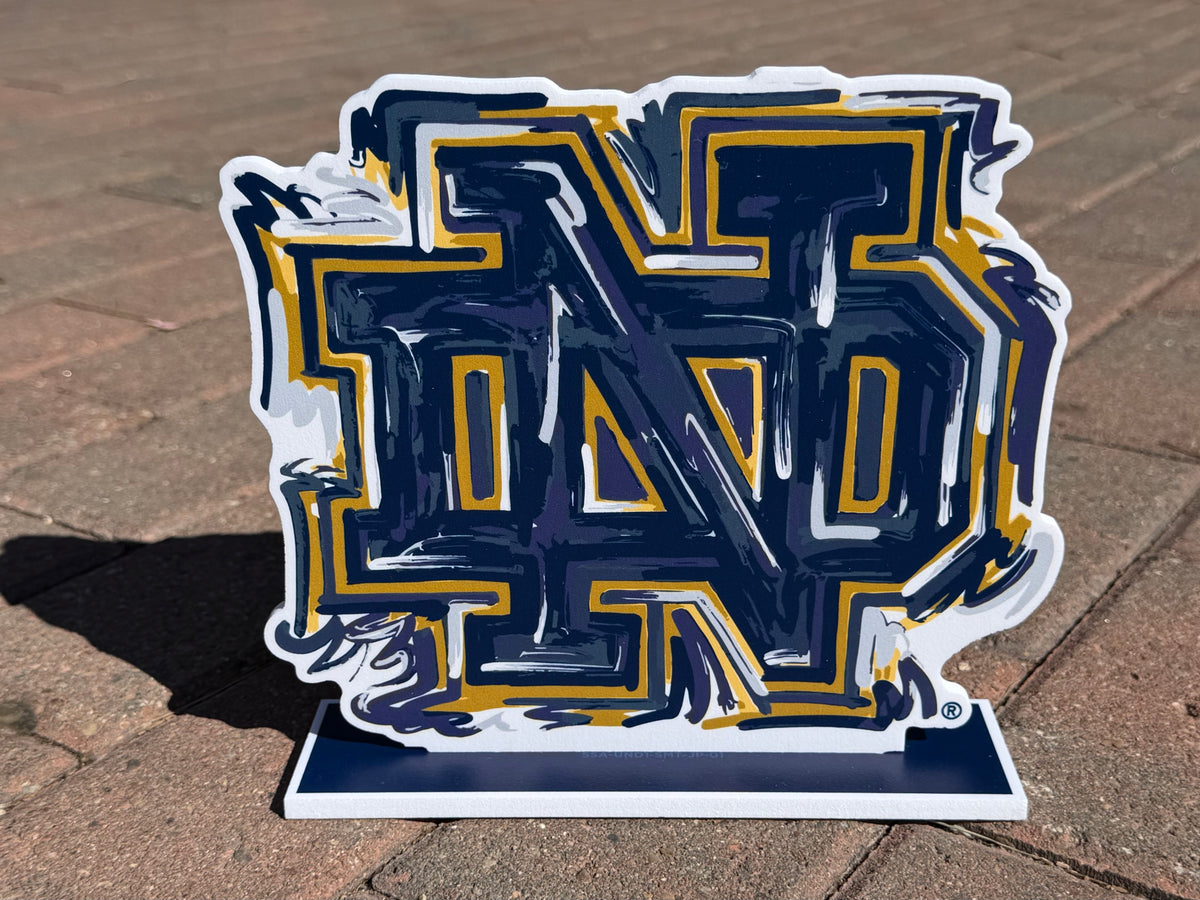Notre Dame ND standee with bold blue and gold letters on flat white base