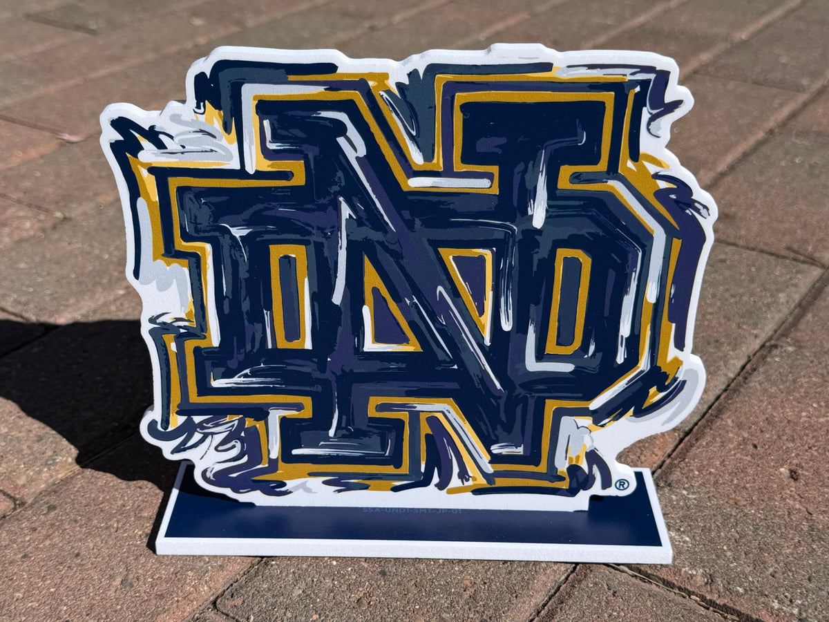 Notre Dame ND standee featuring blue and gold ND letters on white base