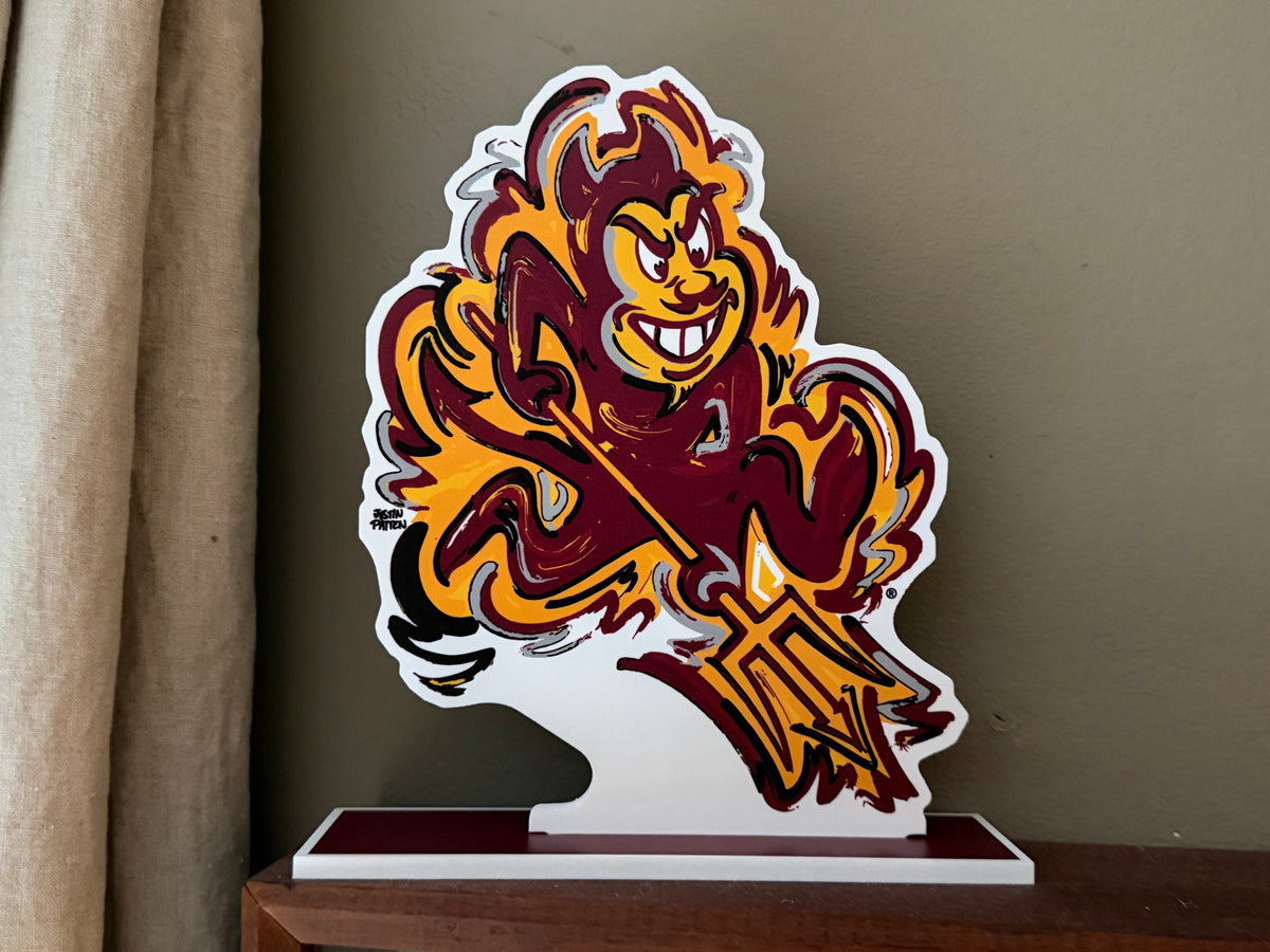 Arizona State Sun Devil mascot standee with fiery maroon and gold devil on base