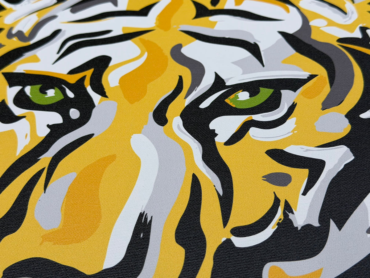 DePauw University tiger wrapped print with a close-up of the yellow, black, and white face