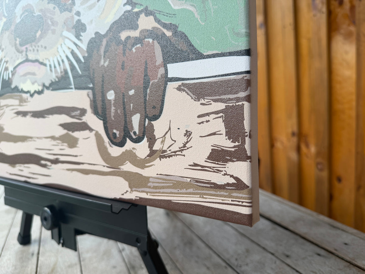 Close-up of the wrapped canvas edge and otter paw illustration