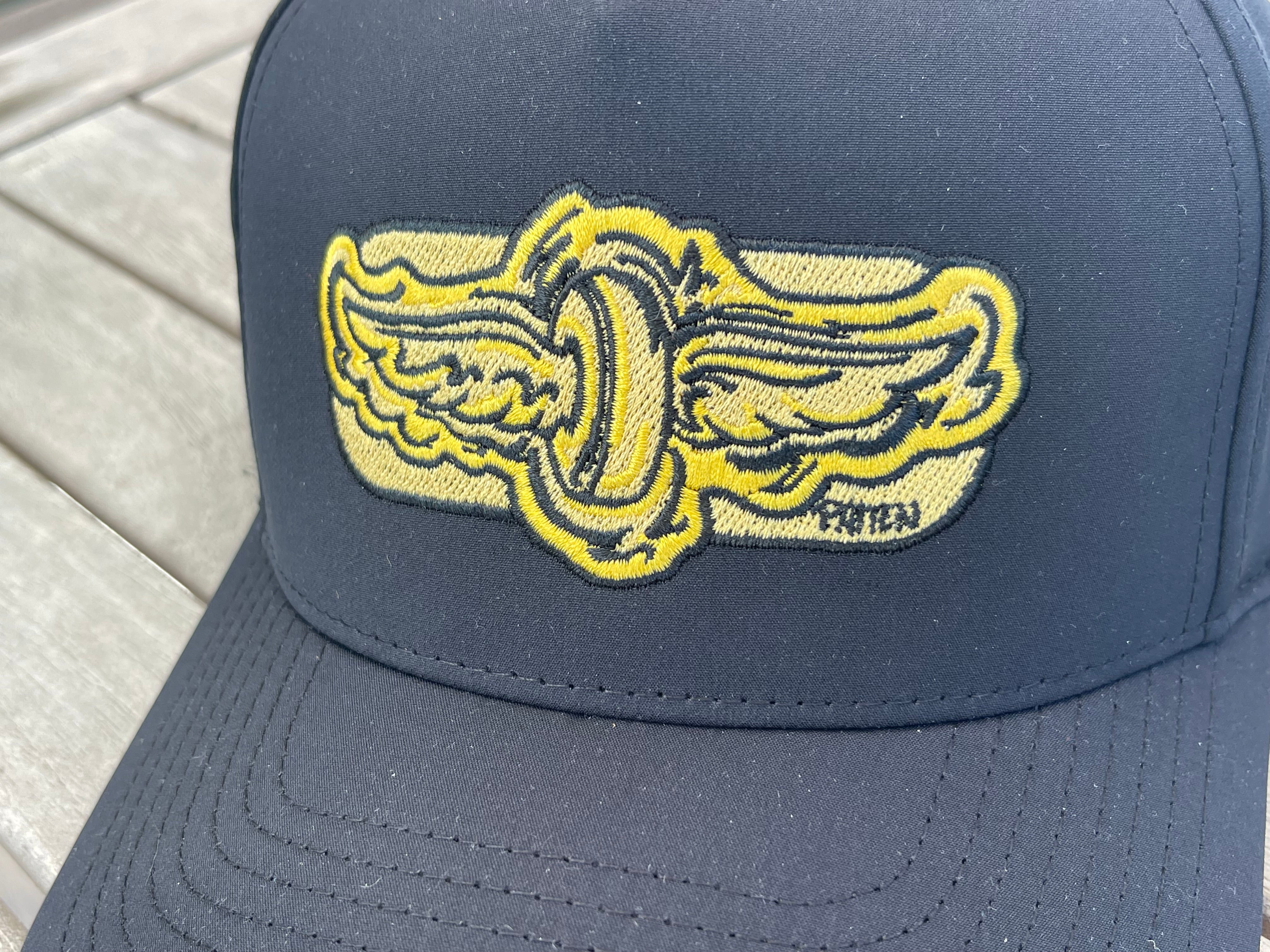 Indianapolis Motor Speedway Gold Wing and Wheel Hat by Justin Patten (Black)