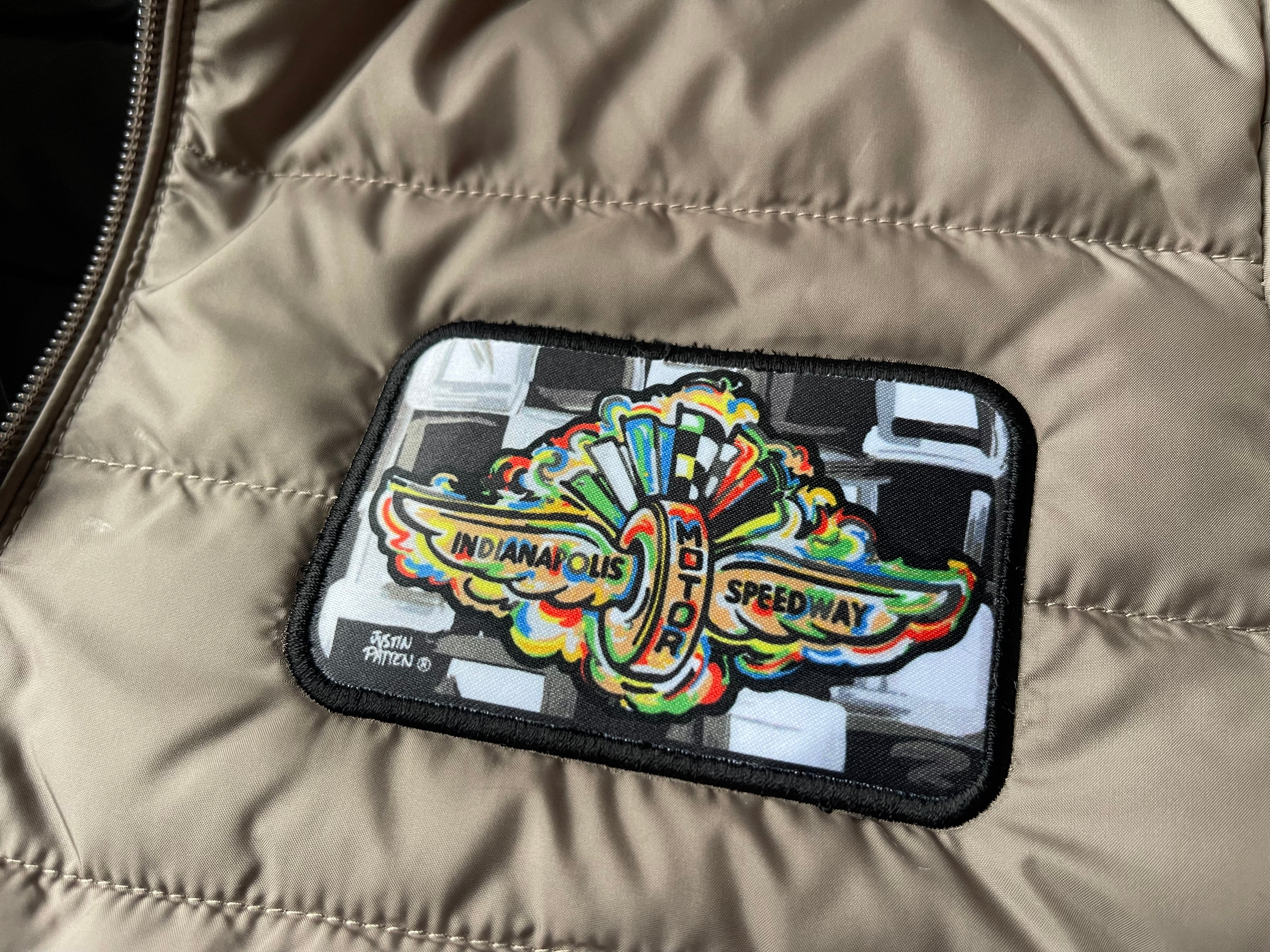 Indianapolis Motor Speedway Wing and Wheel Women's Zip Up Packable Jacket by Justin Patten (Copper) (Women's)