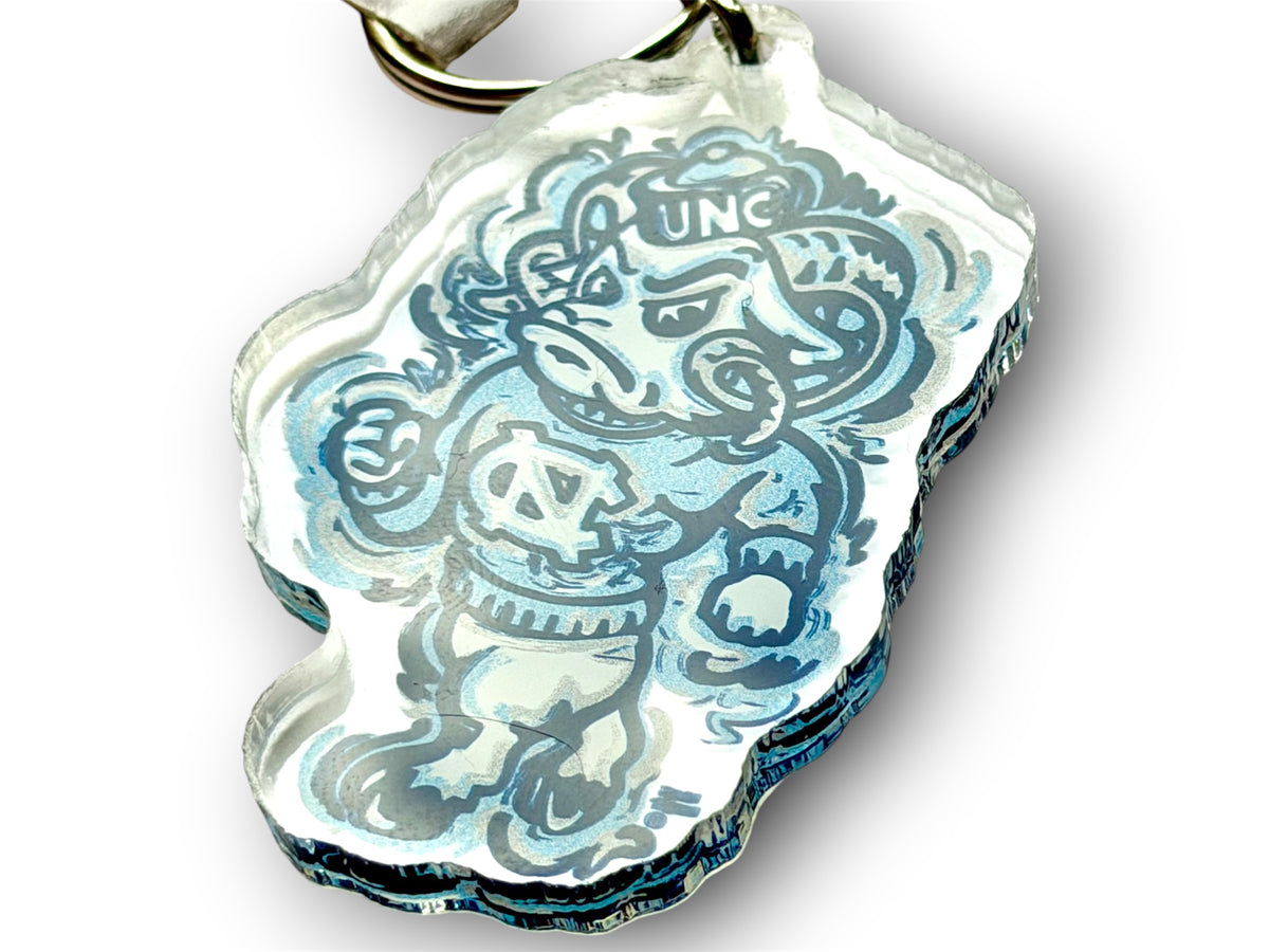 Thick acrylic mascot keychain showing a blue and white University of North Carolina ram.