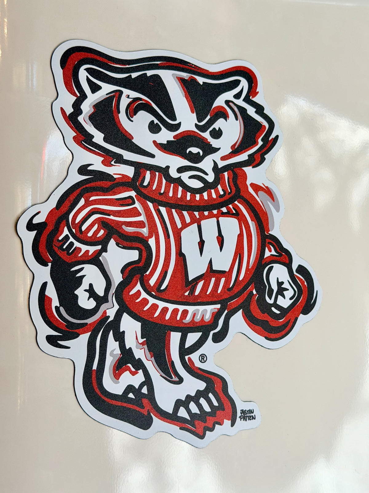 Badger mascot magnet featuring full-body character in red and white knit outfit