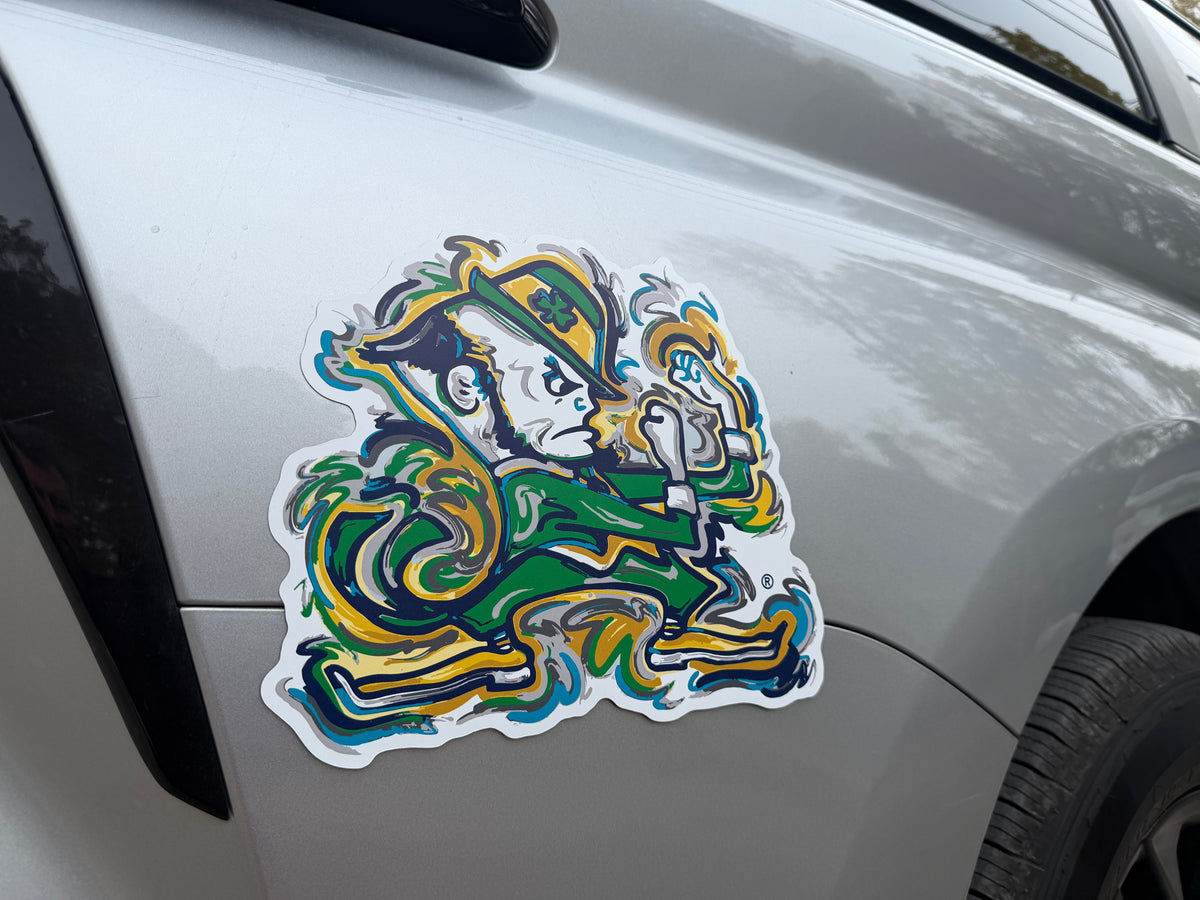 University of Notre Dame leprechaun mascot magnet with green, gold, and navy artwork on a car