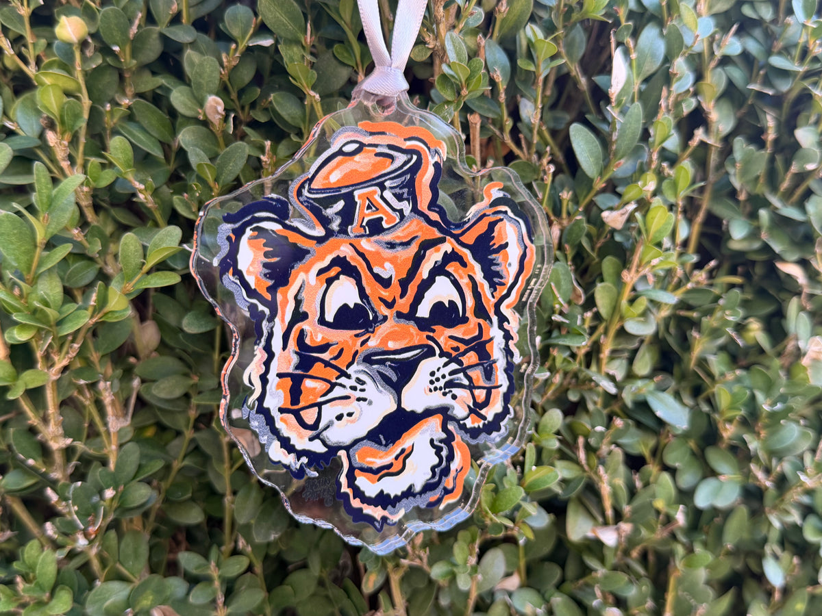 Auburn University Aubie ornament with a beanie, in orange, navy, and white.