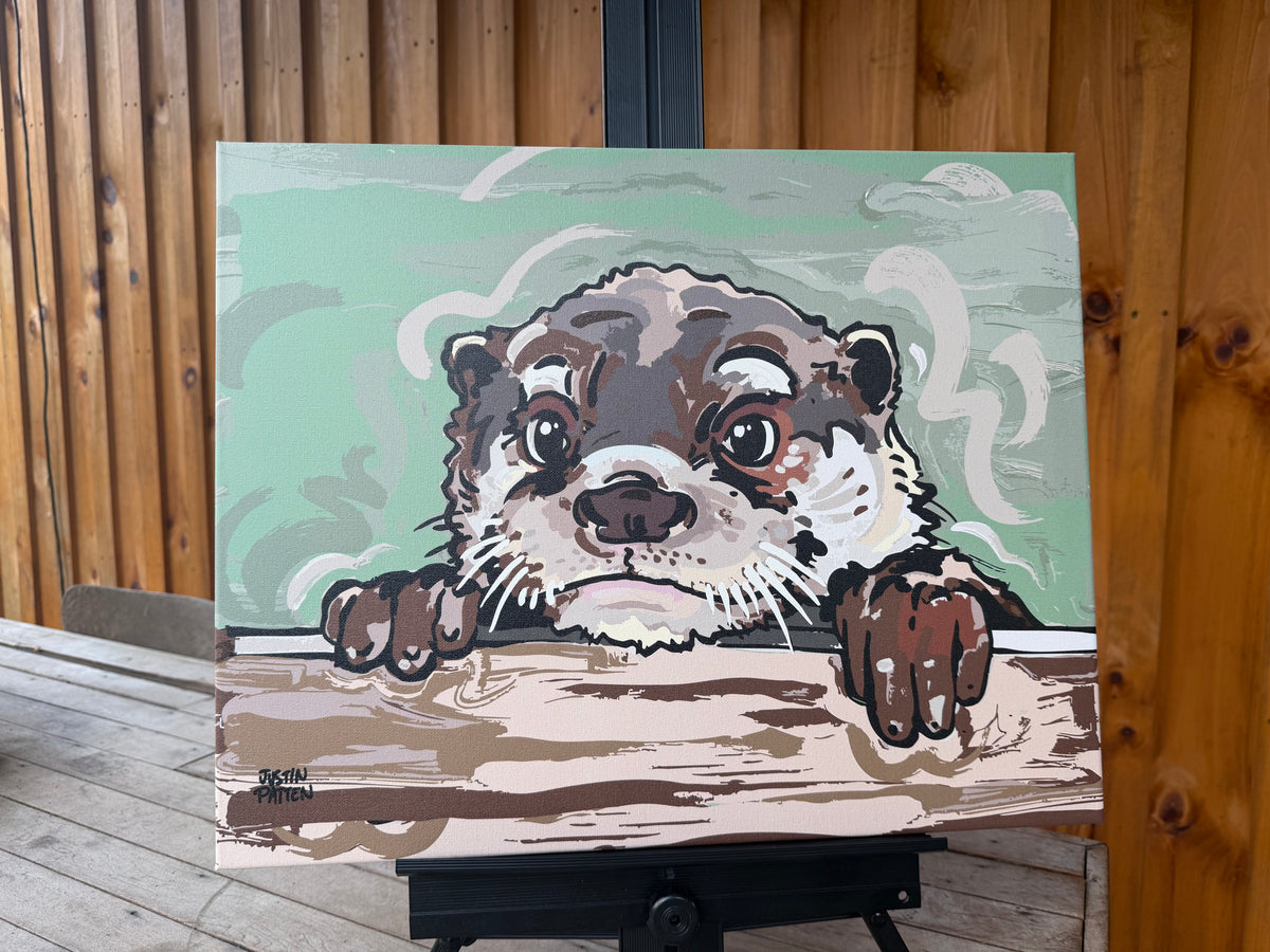 Wrapped canvas print of an otter peeking over a wooden ledge