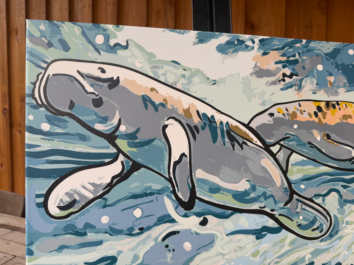Close view of two manatees in a colorful wrapped canvas print