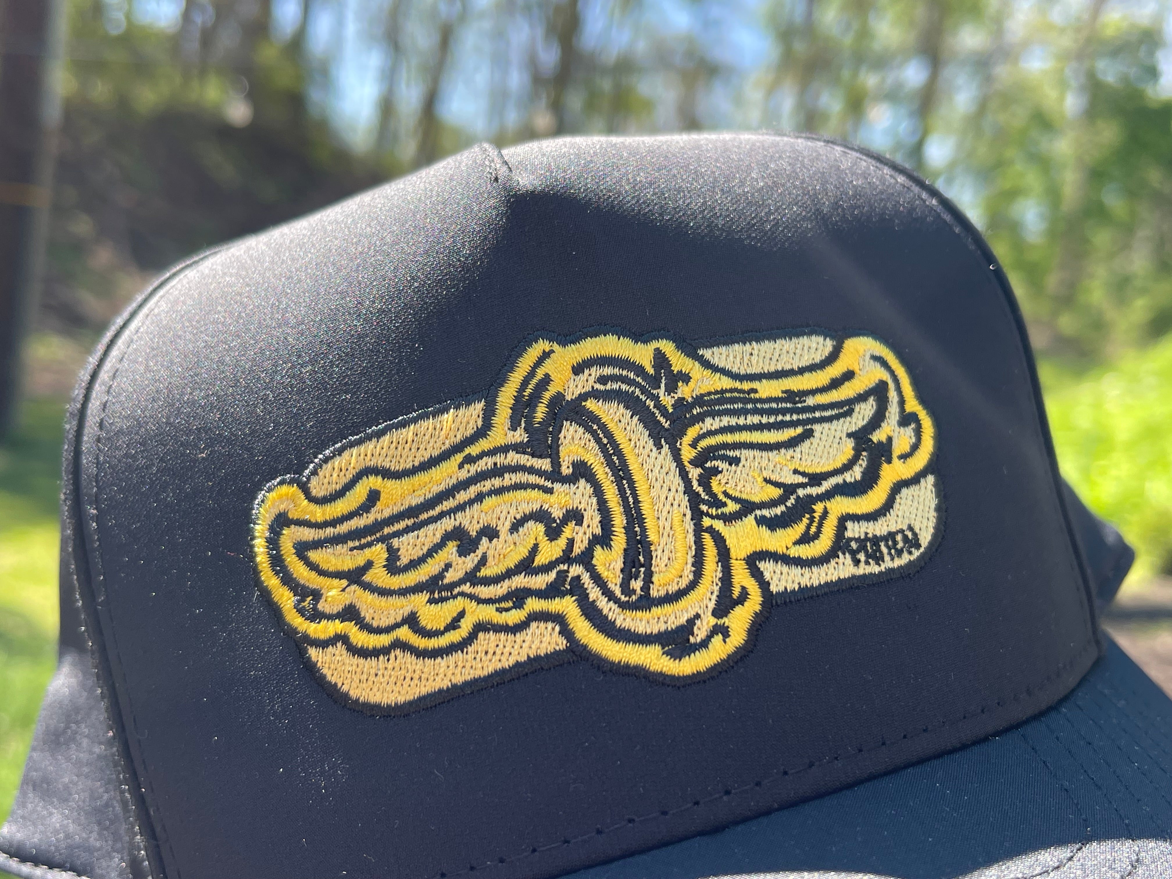 Indianapolis Motor Speedway Gold Wing and Wheel Hat by Justin Patten (Black)