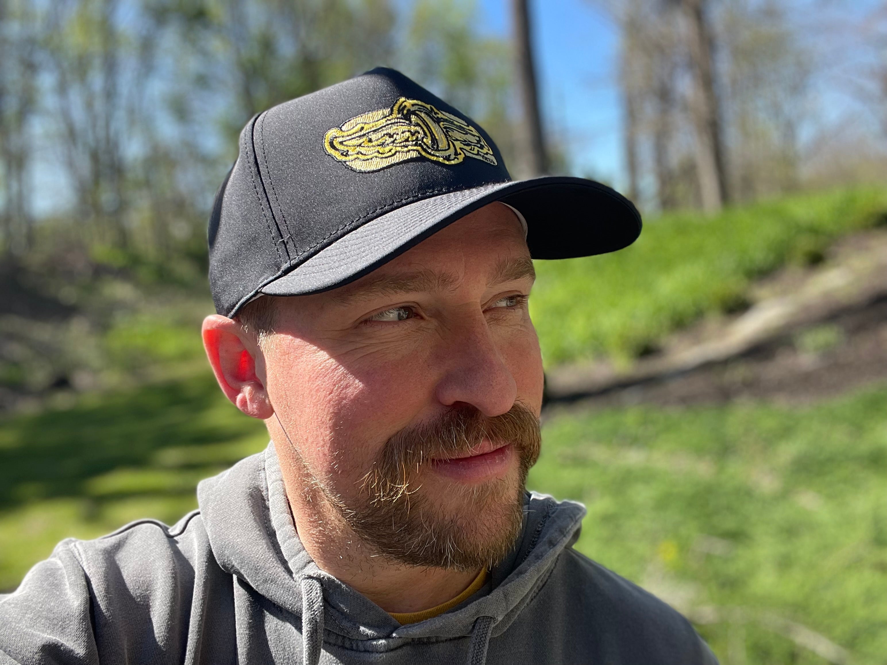 Indianapolis Motor Speedway Gold Wing and Wheel Hat by Justin Patten (Black)