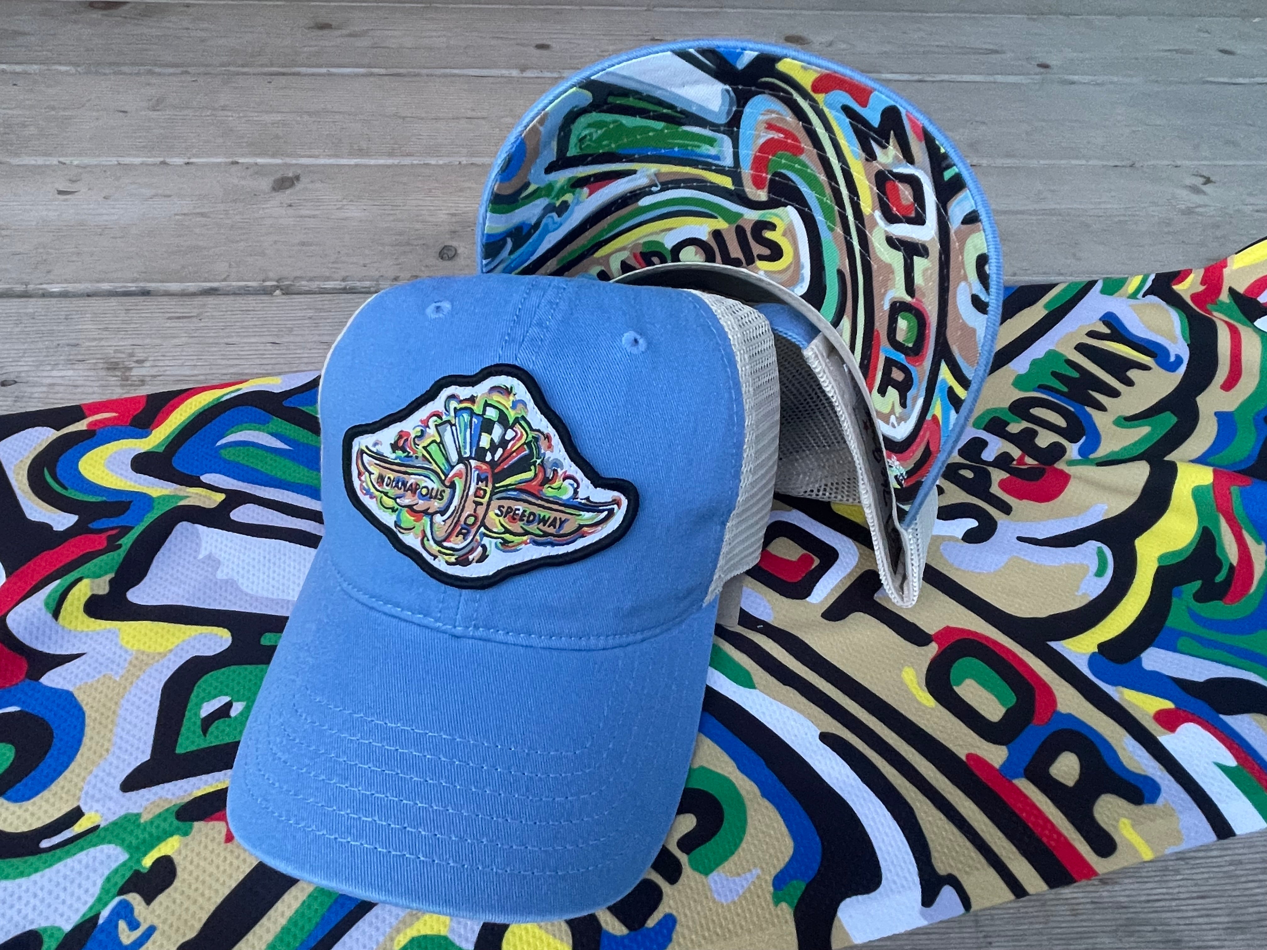Indianapolis Motor Speedway Wing and Wheel Beach Wash Trucker Hat by Justin Patten (Blue Trucker)(IMS, INDY 500, Racing)