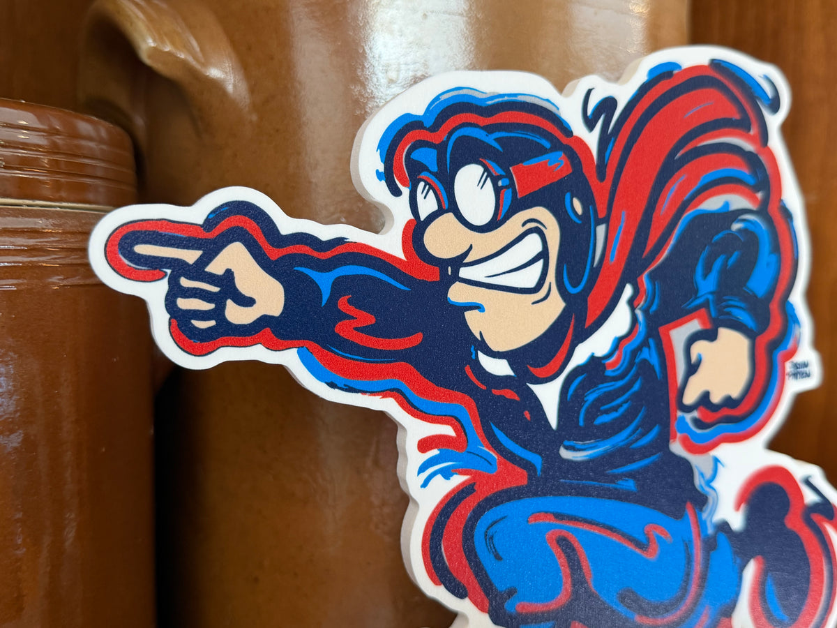 Rudy Flyer standee close-up, blue-and-red character with pointing arm on base