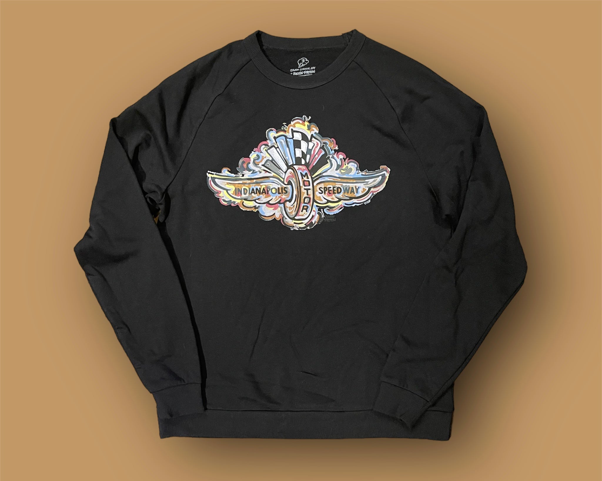 Indianapolis Motor Speedway Wing and Wheel Black Tribled Unisex Crew by Justin Patten