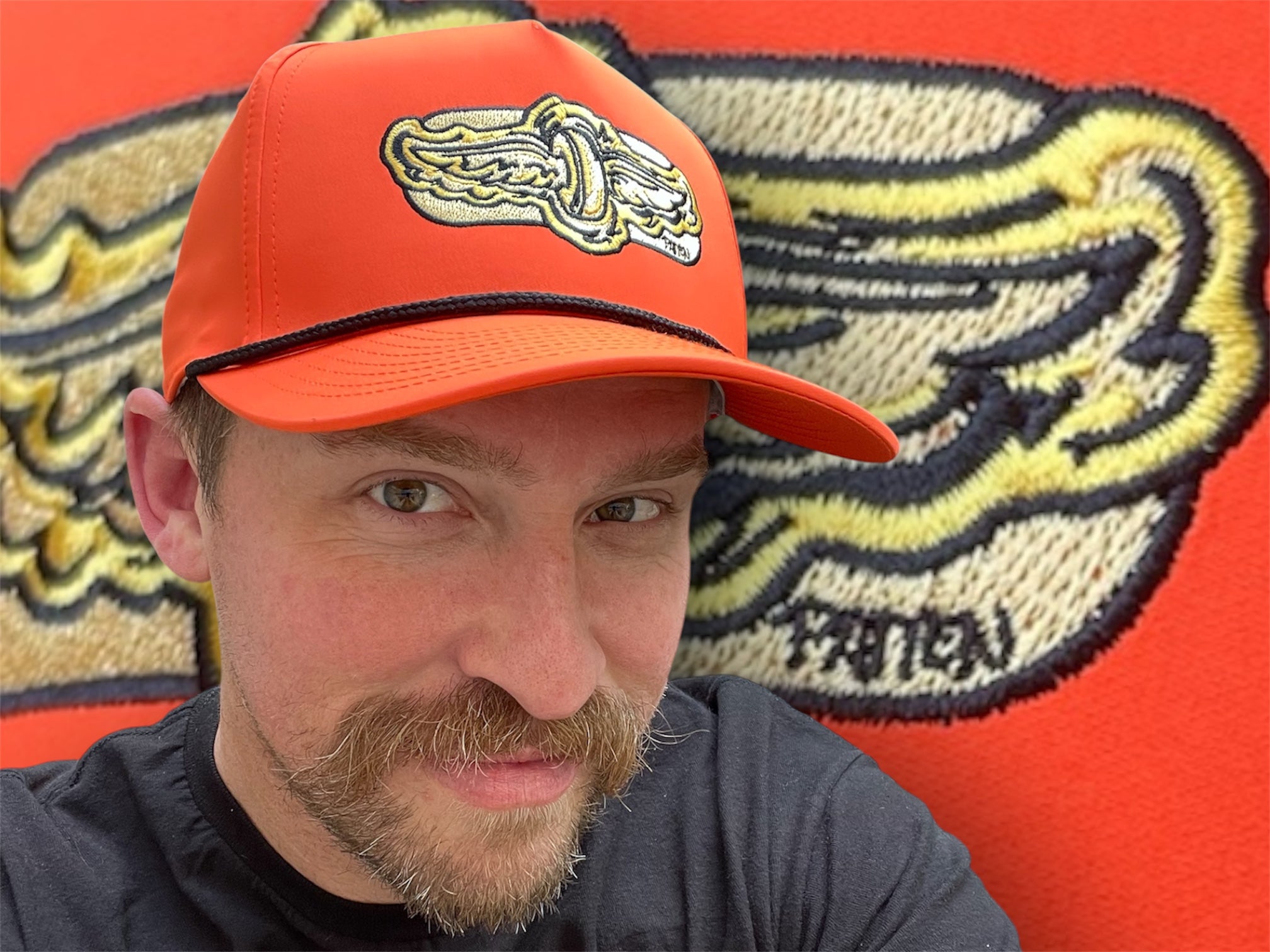 Indianapolis Motor Speedway Gold Wing and Wheel Patch Hat with Black Rope by Justin Patten (Orange with Rope)