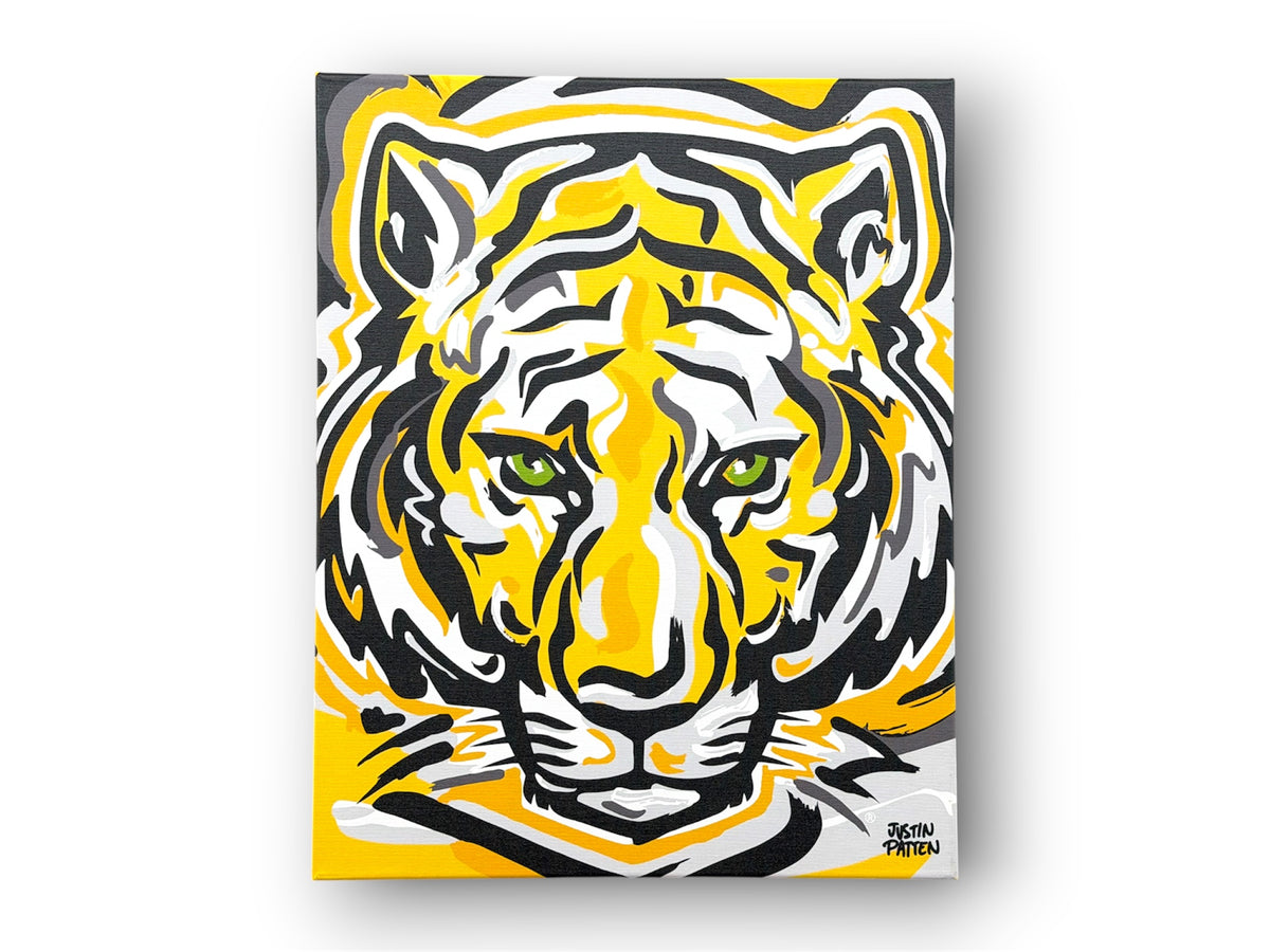 DePauw University wrapped print featuring a full frontal tiger face in yellow, black, and white