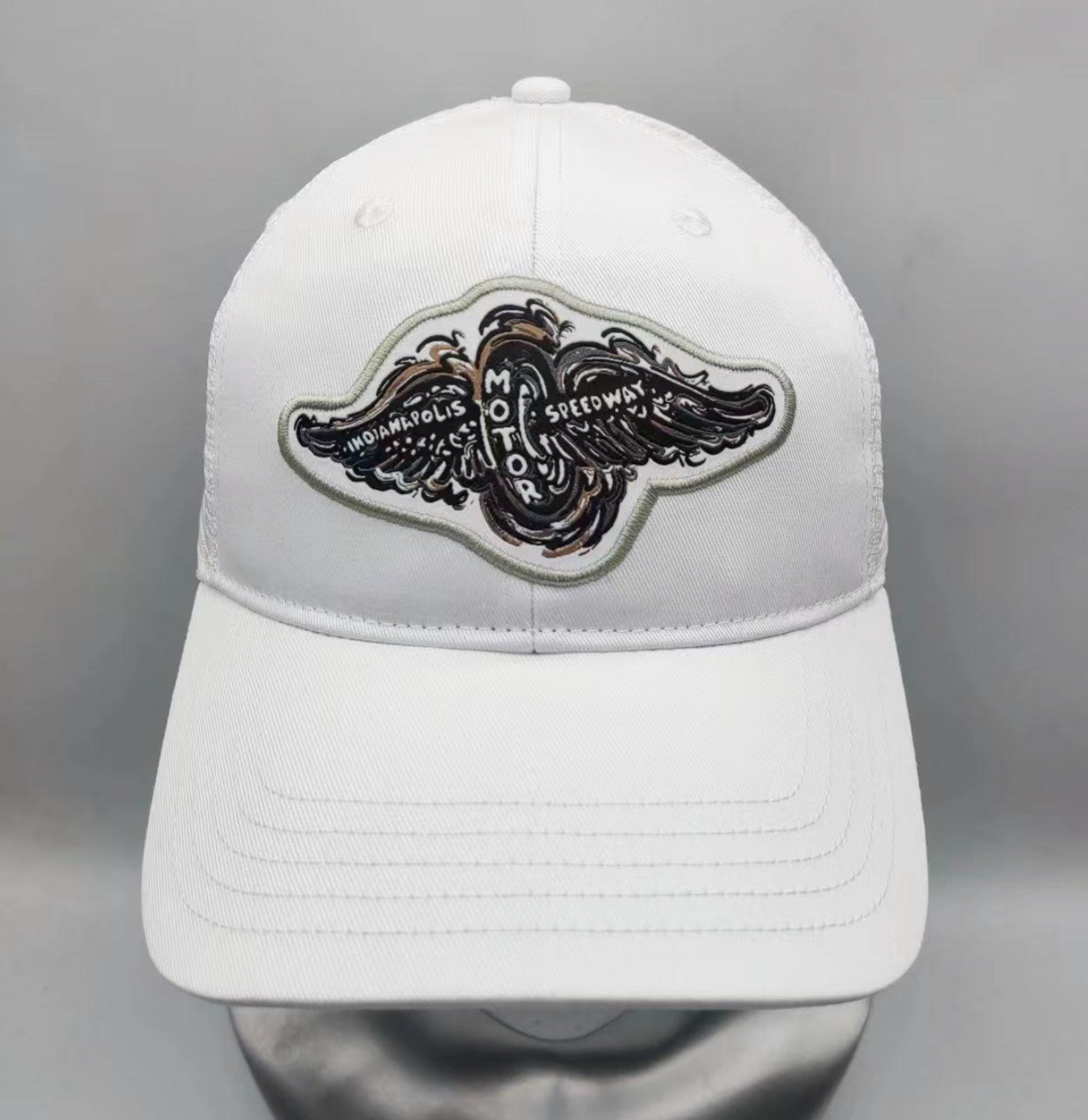 Indianapolis Motor Speedway 1910 Wing and Wheel White Hat by Justin Patten