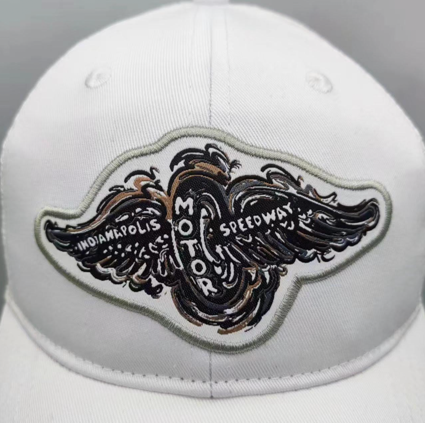 Indianapolis Motor Speedway 1910 Wing and Wheel White Hat by Justin Patten